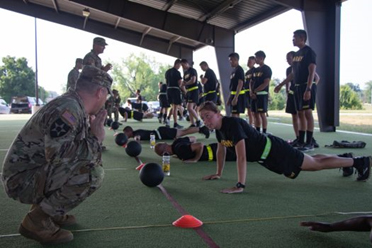 Sgt. 1st Class William Puthoff gives instruction to a Cadet from 1st Regiment, Basic Camp on technique for hand-release pushups, part of the Introduction to the Army Combat Fitness Test at Fort Knox, KY on July 5, 2021. | Photo by Griffin Amrein, CST Public Affairs Sgt. 1st Class William Puthoff gives instruction to a Cadet from 1st Regiment, Basic Camp on technique for hand-release pushups, part of the Introduction to the Army Combat Fitness Test at Fort Knox, KY on July 5, 2021. | Photo by Griffin Amrein, CST Public Affairs