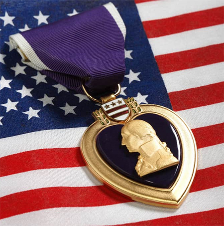 Purple Heart on American flag photo