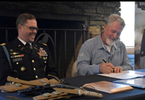 CJ Buck, CEO / Chairman, Buck Knives, Inc. with LTC Spencer Wallace, Commander, Seattle Recruiting Battalion signing the Ceremonial Memorandum of Agreement CJ Buck, CEO / Chairman, Buck Knives, Inc. with LTC Spencer Wallace, Commander, Seattle Recruiting Battalion signing the Ceremonial Memorandum of Agreement