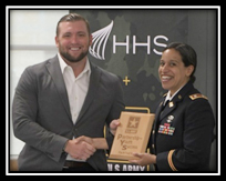 Mr. Bobby Floyd, Chief Executive Officer and LTC Ramirez-Scott, Commander, San Antonio Army Recruiting Battalion hold the Ceremonial PaYS Plaque