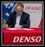 Kevin Carson, President of Denso Manufacturing Michigan, Inc. signs PaYS Memorandum 