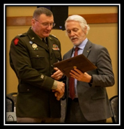 MG Gregory Knight, VTARNG Adjutant General presents and award to Keith Klemmer, Business Development Representative for PaYS Partner BAE systems