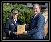 BG Laura Clellan, The Adjutant General COARNG presents PaYS plaque to Bob Frenzel, Xcel CEO