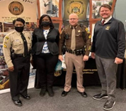 Malinda Johnson, Senior Marketer and James Meade, PaYS Marketer pose with Hampton Sheriff`s Department Malinda Johnson, Senior Marketer and James Meade, PaYS Marketer pose with Hampton Sheriff`s Department