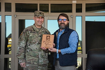 LTC Brian Meister, Battalion Commander, Columbia Recruiting Battalion  presents PaYS plaque to Mr. Ashley Rawl, VP of Sales, Marketing & Product Development, Walter P. Rawl & Sons, Inc.