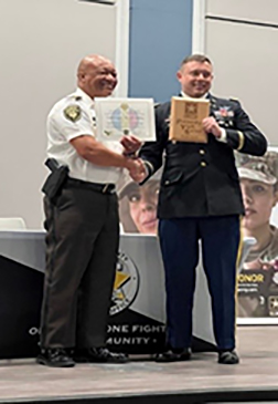 LTC David Hensel, Commander, Atlanta Army Recruiting Battalion presents Sheriff Craig Owens, Cobb County Sheriff with the PaYS Plaque and Certificate