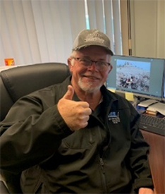 Mr. Richard Merrill, Operations Manager, JPW Erectors gives the thumbs up after learning how to put jobs in to the PaYS System.