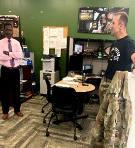 Calvin Liggons speaking with a recruiter assigned to Richmond Battalion Calvin Liggons speaking with a recruiter assigned to Richmond Battalion