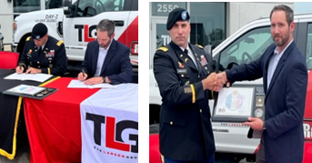 Columbus Army Recruiting BN Commander LTC Brett Gambacorta and TLG Peterbilt VP of HR Nathan Conn sign the PaYS Ceremonial Agreement during the signing ceremony in Cincinnati, and Mr. Conn is presented with the PaYS Certificate of Partnership plaque by LTC Gambacorta