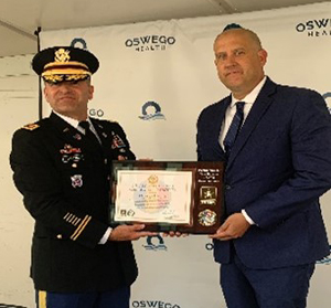 LTC John Dickens, Commander, Syracuse Recruiting Battalion with Mr. Marq Brown, President of Human Resources, Oswego LTC John Dickens, Commander, Syracuse Recruiting Battalion with Mr. Marq Brown, President of Human Resources, Oswego
