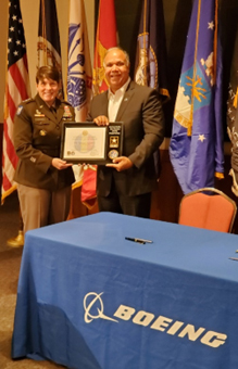 LTG Gervais and Boeing's VP Army Systems, Defense, Space and Security, Boeing Government Operations, LTG (R) Anthony Crutchfield display the PaYS Plaque