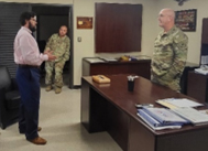 Travis Carter discussing the Pays Program with COL Mark Prymek and CSM Patrick Sandel during a briefing with LAARNG RRB. 