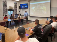 PaYS Marketing Analyst Travis Carter briefs Cadets from the University of Nebraska Lincoln and Kearney about the PaYS Program.