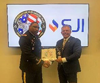 LTC Hall presents Mr. McLaughlin with the PaYS Certificate of Participation Plaque LTC Hall presents Mr. McLaughlin with the PaYS Certificate of Participation Plaque