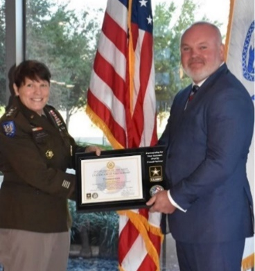 Mr. Jeremy Thigpin, Transocean CEO is presented the PaYS Certificate of Participation Plaque by LTG Gervais, DCG, TRADOC.