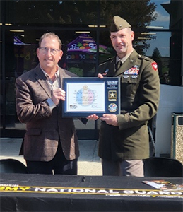 Jeffrey McMahon, CFO, Good Foods Group, LLC receives the PaYS Certificate of Participation Plaque from BG Matthew Strub, Deputy Adjutant General, WIARNG. Jeffrey McMahon, CFO, Good Foods Group, LLC receives the PaYS Certificate of Participation Plaque from BG Matthew Strub, Deputy Adjutant General, WIARNG.