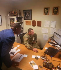 Curtis Taylor and SFC. Hunter C. Norton,  Station Commander, Northside Atlanta Recruiting  Station, discussing PaYS systems 