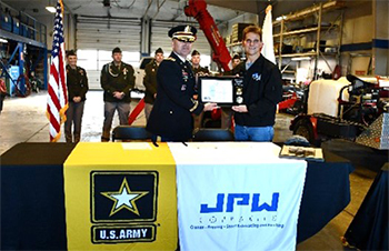 (l-r) LTC Dickens and Mr. Wozniczka--presenting the Ceremonial Plaque 