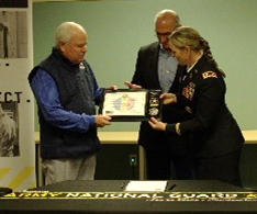 (l-r) Mr. Culver, LTC Hellenbrand, and Mr. Silva with the ceremonial plaque.