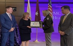 (l-r) Mr. Sevco, Mrs. Holder, BG Krueger, and Mr. Lee pose with PaYS plaque.