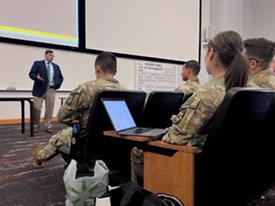 Mr. Carter briefs Cadets from San Diego State Army ROTC on the benefits of the PaYS program. Mr. Carter briefs Cadets from San Diego State Army ROTC on the benefits of the PaYS program.