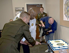 LTC Brian Meister, Commander, Columbia Recruiting Battalion and Sheriff Quentin Miller, Sheriff, Buncombe County Sheriff's Office, cut the ceremonial cake during the PaYS Signing Ceremony welcoming Buncombe County Sheriff's Office to the PaYS Program. LTC Brian Meister, Commander, Columbia Recruiting Battalion and Sheriff Quentin Miller, Sheriff, Buncombe County Sheriff's Office, cut the ceremonial cake during the PaYS Signing Ceremony welcoming Buncombe County Sheriff's Office to the PaYS Program.