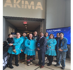 (l-r) Thor Lie, Shylena Lie, Rosie Hensley, Judy Huss, Martin Woods, Thomas Parker, Christina Hensley (back), Sidney Sherman, Reggie Joule, III (back), Richard Atoruk --- 
Qikiqtagruk Northern Light Dancers discussing life in Alaska with Mr. Parker.