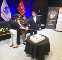 LTG Gervais, Mr. McCutcheon, Future Soldier, and ROTC Scholarship recipient cut the cake.