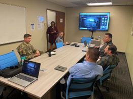 Crancena Ross conducts an overview with staff of the City of Seattle and members from the Seattle Army Recruiting Battalion. (L-R) MAJ Aaron Oswald, Crancena Ross, Mr. Michael Dobbs, Caitlin Gonzales, Doug Cisler, Ryan Jones and Mike Forehand.