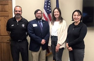 L-R Mr. Anwar Rida (President TMCO), Mr. Carter, Mrs. Ashlee Harms (HR Manager TMCO), and Dr. Diane Temme Stinton (CEO and Owner, TMCO) take a picture after touring the TMCO facilities and talking about PaYS.