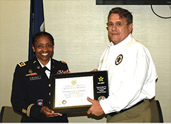 LTC Felichia Brooks, Commander, Baltimore Recruiting Battalion, presented Mark Butler, Sheriff, Warren County Sheriff’s Office, with the plaque and certificate of participation that bonds the alliance between the U.S. Army and Warren County. LTC Felichia Brooks, Commander, Baltimore Recruiting Battalion, presented Mark Butler, Sheriff, Warren County Sheriff’s Office, with the plaque and certificate of participation that bonds the alliance between the U.S. Army and Warren County.