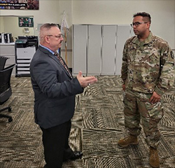 (l-r) Raymond Snow and SSG Nathan Walker discussed PaYS updates and potential partners.