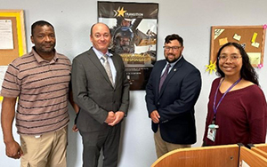 (L-R) Timothy Mullins (Transition Services Manager), Matthew Green (Army PaYS Marketer), Travis Carter (Army PaYS Marketer) and Alexis Williams-Jenkins (Contract Installation Manager)