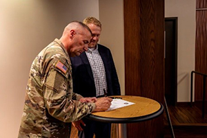 MG Porter and Mr. Tipotsch sign the ceremonial PaYS Memorandum of Agreement.