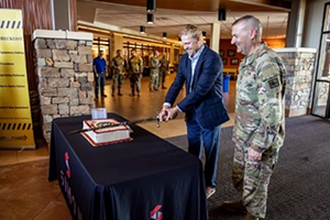 MG Porter and Mr. Tipotsch cut the cake following the ceremony. MG Porter and Mr. Tipotsch cut the cake following the ceremony.
