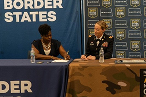 (l-r) Mrs. Farmer and LTC Daschendorf signed the ceremonial PaYS Memorandum of Agreement. (l-r) Mrs. Farmer and LTC Daschendorf signed the ceremonial PaYS Memorandum of Agreement.