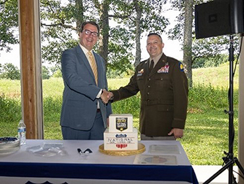 BG Justin Osberg, Deputy Assistant Adjutant General, ILARNG, welcomes Tim Helenthal, CEO & Chairman, National Van Lines to the PaYS program.