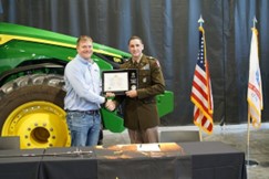 (l-r) Mr. Allen and CPT Miller pose with the ceremonial plaque. 