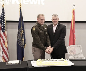 BG Strong and Mr. Medcalf cut the cake to start the reception following the ceremony.