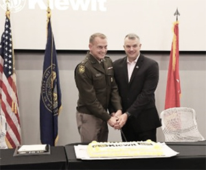 BG Strong and Mr. Medcalf cut the cake to start the reception following the ceremony. BG Strong and Mr. Medcalf cut the cake to start the reception following the ceremony.