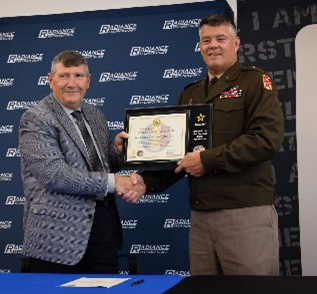 BG Terry Grisham, Deputy Commanding General, ALARNG presents plaque to Bill Bailey, CEO, Radiance Technologies