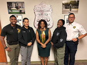 Ms. Ross with San Antonio Police Officers Ms. Ross with San Antonio Police Officers
