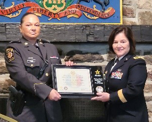 (l-r) LTC Joanne Reed, Deputy Commissioner of Staff, Pennsylvania State Police, and BG Laura McHugh, Deputy Adjutant General, Pennsylvania Army National Guard, with the PaYS Ceremonial Plaque