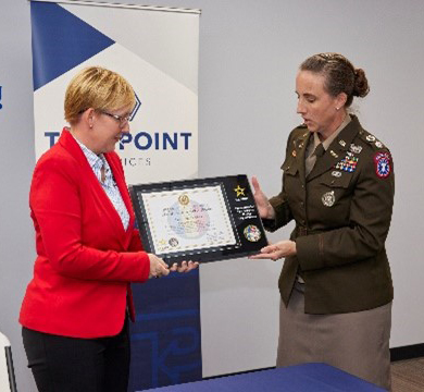 Mrs. Buccelli, TurnPoint Service, and LTC McFarland, Nashville Recruiting BN, with the PaYS plaque Mrs. Buccelli, TurnPoint Service, and LTC McFarland, Nashville Recruiting BN, with the PaYS plaque