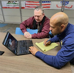 Raymond Snow and Officer Tyree Williams, Louisville Metro PD