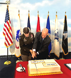 LTG Gervais and Mike Spanos cut the ceremonial cake with a saber
