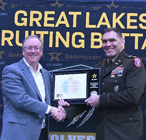 LTC Heffner and Mr. Doyle pose with the certificate of participation. 