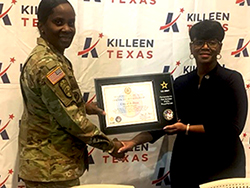 COL Lakicia R. Stokes and Debbie Nash-King with the PaYS plaque