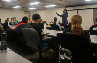 Samuel Armstrong briefs and registers INARNG Gold Phase Soldiers at Camp Atterbury