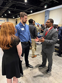 Thomas Parker with Job fair attendees Thomas Parker with Job fair attendees